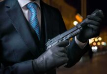 An assassin holding a gun