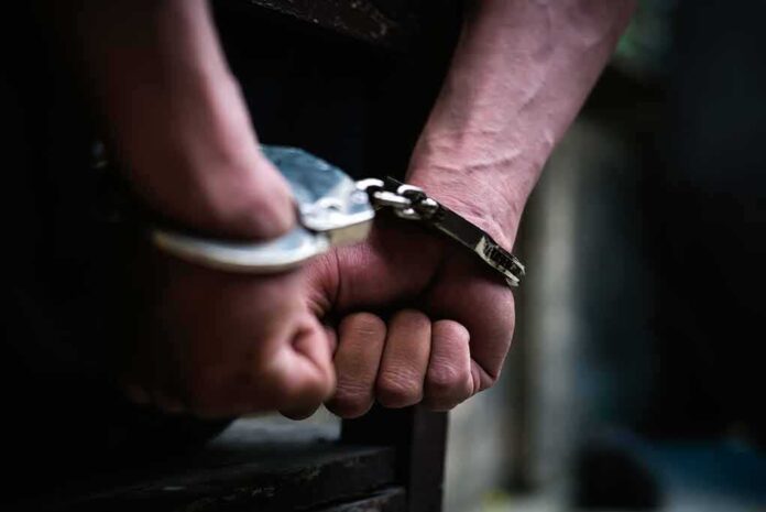 1338116366 featured image Hands in handcuffs