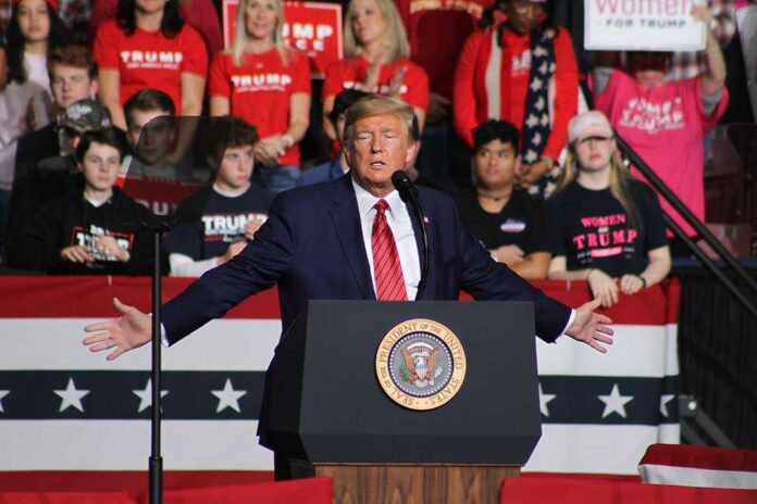 1662925921 featured image Politician speaking at rally with supporters behind him