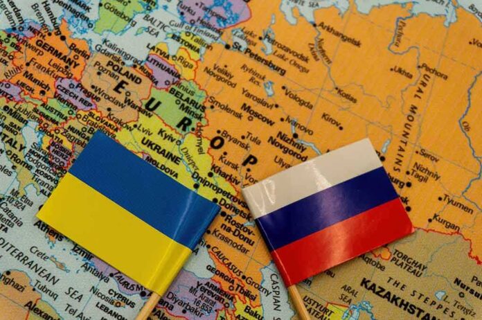 2109598166 featured image Russian and Ukrainian flags on a map