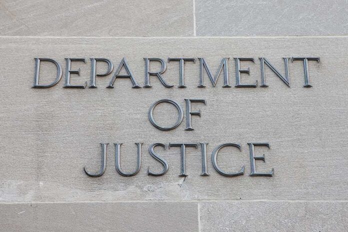 506478736 featured image Department of Justice sign on building wall