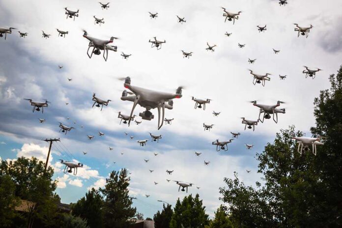 709014991 featured image Many drones flying in a cloudy sky