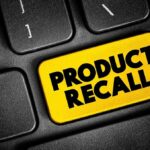 Black keyboard with Product Recall yellow key