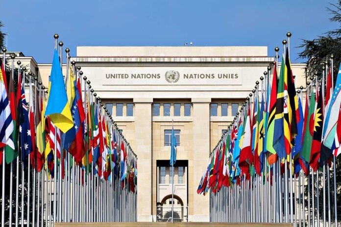 423802144 featured image United Nations building with numerous national flags outside