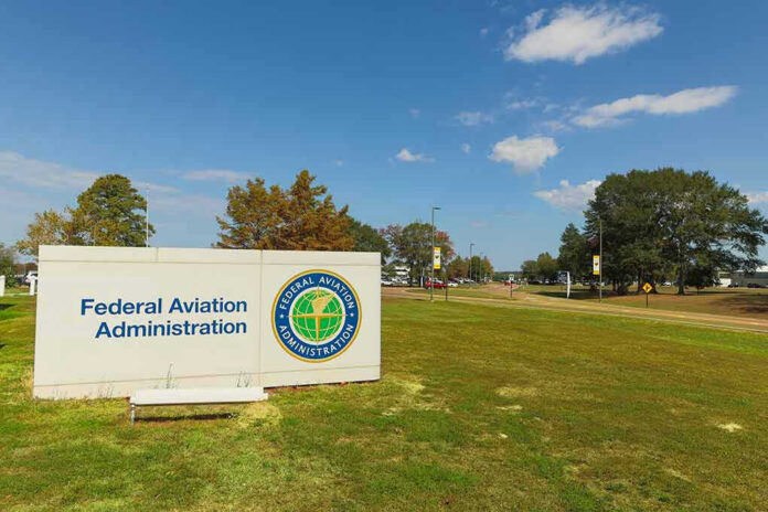 2370263441 Federal Aviation Administration sign on grassy lawn