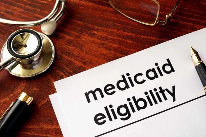 640488934 featured image Stethoscope pen document about Medicaid eligibility on table