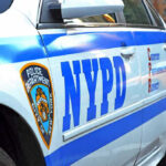 Mamdani’s Move: No More Cops in Crises? NYPD police car with logo and text.