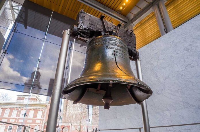 The Liberty Bell displayed in a modern museum setting