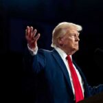 Trump Rewires U.S. Immigration Overnight – BYPASSES Congress A man in a suit gesturing during a speech