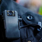 Body Cameras BACKFIRE—Democrats Now Regret Push Body camera attached to a black uniform.