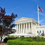 Ted Cruz’s Supreme Court Buzz: Real or Political Play? Supreme Court building with American flag and surrounding greenery