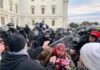 A tense standoff between protesters and police at a demonstration
