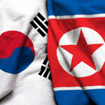 Ex-President Gets 30 Years Over N.Korea Drone Incident South Korean and North Korean flags side by side