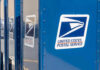 Rapper Sentenced In Bizarre Mail-Theft Scheme! Blue USPS mail collection boxes in a row.