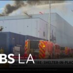Toxic Plume Blankets City After Warehouse Fire! Firefighters gain control of Boyle Heights warehouse blaze, residents remain impacted