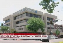 Man ROBS Bank Strapped With Explosives! Hostage situation underway at Chase Bank in downtown Bakersfield