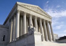 Senator’s Bombshell: Court Expansion ‘On The Table’ Exterior view of the Supreme Court building with columns and a statue of justice