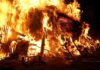 Hero Firefighter Exposed As Town Arsonist! A large fire engulfing debris at night