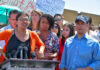 Hollywood Star Torches Tlaib — What Sparked It? Group of people at an outdoor press event.