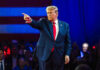 Trump Sounds Europe Alarm During Turkey Visit Person in suit pointing during a public event.