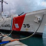 China Blasts Cannon at Foreign Vessel! Coast Guard cutter moored at a pier