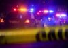 Senate Candidate Who Co-Hosts Drag Shows Convicted of Child Cruelty! Police cars with flashing lights behind yellow caution tape at night
