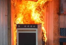 Mother Murders Newborn in Oven – Walks Free Kitchen stove engulfed in flames against a wall