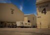 Hollywood Exodus – Paramount Leaves California Film studio stages with numbered buildings and trailer