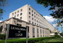 Trump Drops Muslim Nation From Terror Watchlist Department of State building exterior on a sunny day