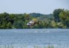 Congressman Ditches Crashed Plane Injured Helicopter hovering low over a lake near kayakers