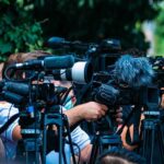 South Korea CAPTURE N.Korea Soldier Doing THIS! TV news cameras crowding together at an outdoor event