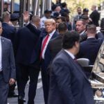 Widow’s Bombshell Rattles Secret Service Donald Trump waving while surrounded by security personnel on a city street