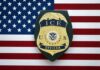 ICE officer badge on American flag background