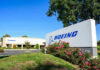 FAA Greenlights Controversial Boeing Planes Boeing office building with signage and landscaping.