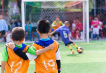 2 DEAD – Pickup Truck Plows Through Soccer Game Two boys watching a soccer game together.