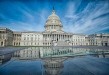 Wacky Senator Pushes Insane Conspiracy Theory About Trump United States Capitol building with dome and reflection