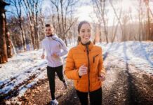 Elite Runner Killed Hours Before Marathon Two people jogging on a snowy park path