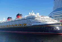 Passengers Stranded As Fuel Bill Ends Cruise Voyage Cruise ship docked at a modern harbor terminal