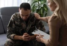 Supreme Court Clash: Divorce vs. VA Pay Soldier in camouflage receives support from a counselor