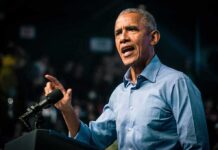 Obama’s Campaign With El-Sayed Just Turned Very Awkward Rob Nabors speaking at a podium with a microphone