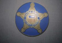 Secret Service Shocker: 10,000 Threats This Year United States Secret Service badge emblem on blue background